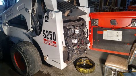 changing oil in a skid steer|bobcat s250 oil change.